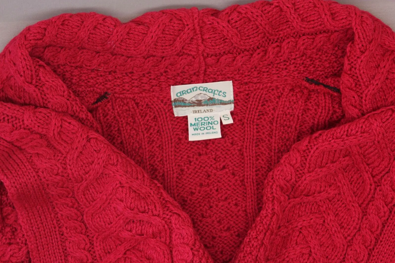 Aran Craft Women's Merino Wool Cardigan with Waterfall Neckline. A290440