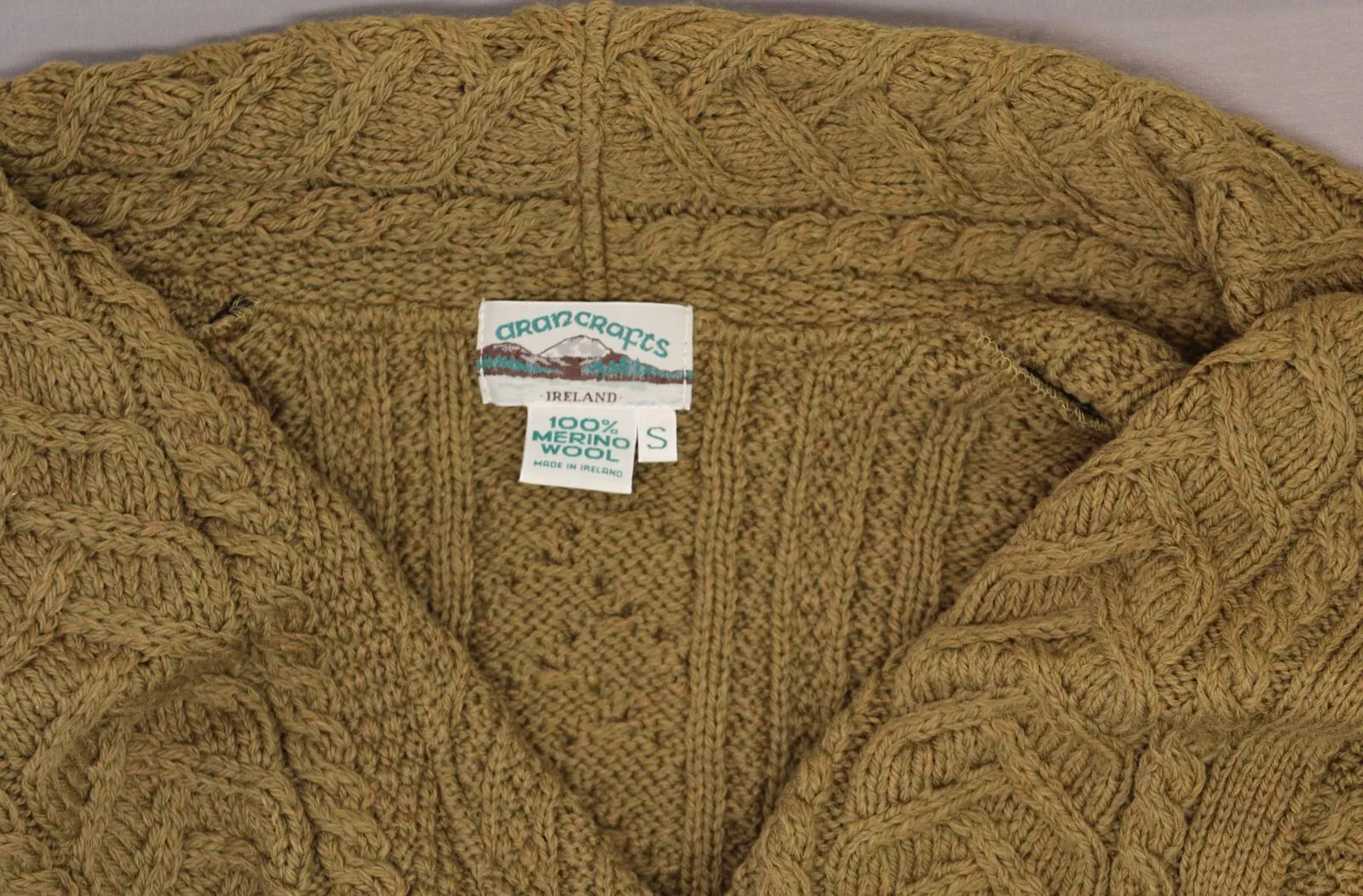 Aran Craft Women's Merino Wool Cardigan with Waterfall Neckline. A290440