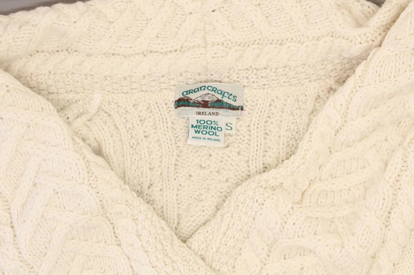 Aran Craft Women's Merino Wool Cardigan with Waterfall Neckline. A290440