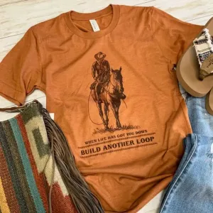 Women's "When Life Has Got You Down Build Another Loop" Graphic T-Shirt in Rust